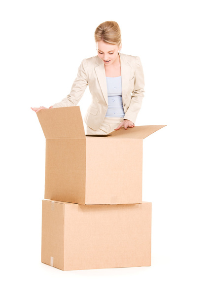 Businesswoman with boxes - Valokuva, kuva
