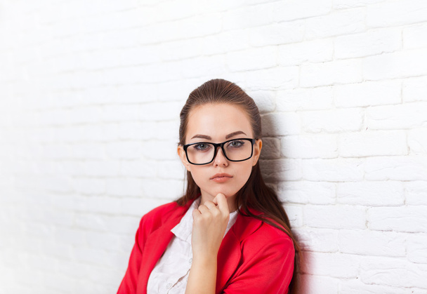 Businesswoman serious wear red jacket glasses hold chin ponder - Foto, Imagem