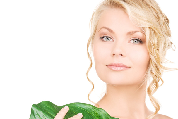Woman with green leaf - Foto, immagini