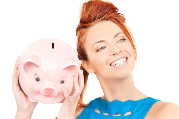 Lovely woman with piggy bank - Fotografie, Obrázek