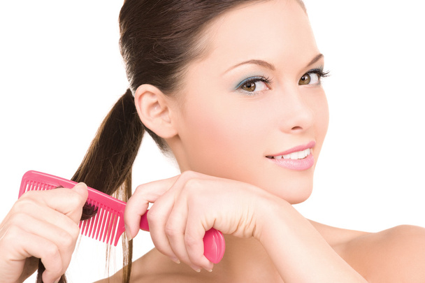 Woman with comb - Foto, Imagen