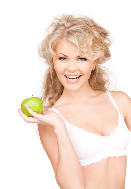 Young beautiful woman with green apple - Foto, Imagen