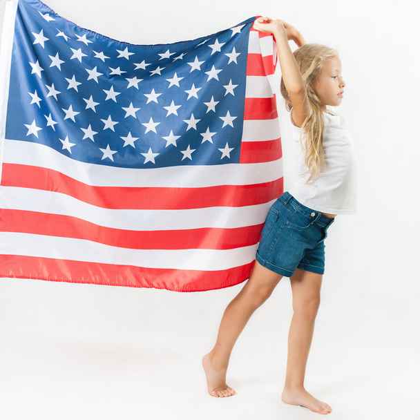 American blonde girl holding American national flag - Fotoğraf, Görsel