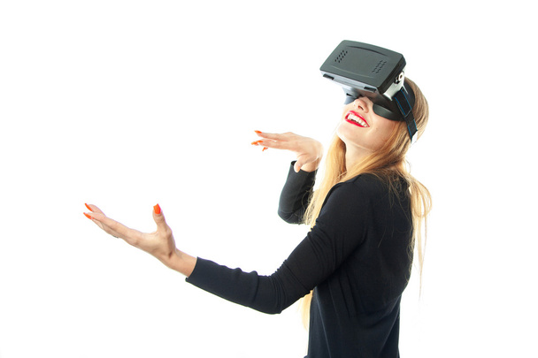 woman in virtual reality helmet - Фото, изображение