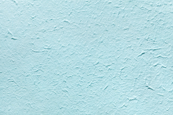 Papel decorativo de color azul claro y suave, imita el yeso viejo o la superficie azul vintage de la fachada
. - Foto, imagen