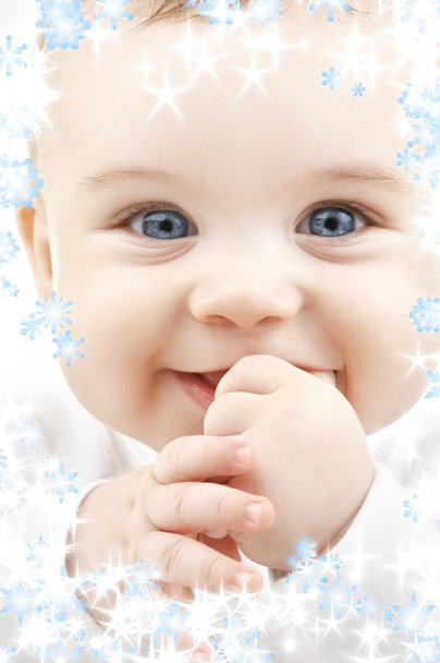 Baby with snowflakes - Photo, Image