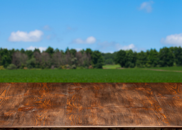 Very nice wooden table with the landscape. - Photo, Image