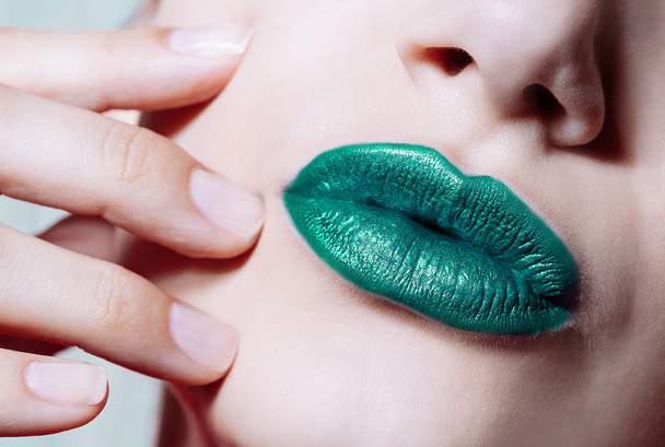 Woman  lips with glossy green lipstick - Zdjęcie, obraz