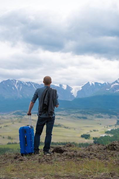 male traveler on a background of mountains - Valokuva, kuva