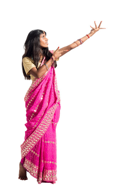 Beautiful young indian woman dancing isolated on white backgroun - Photo, Image