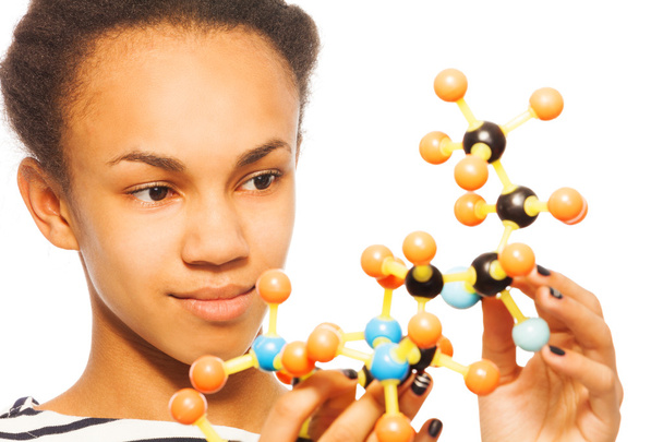  アフリカの女の子と分子モデル - 写真・画像