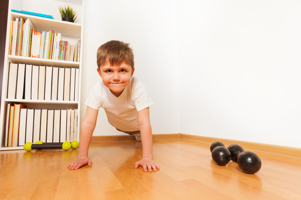 press-ups exercise   by preschooler boy  - Photo, Image
