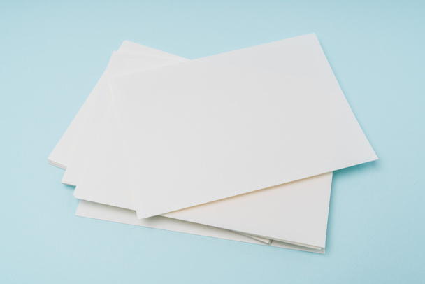 Blank business card on blue background . - Foto, immagini