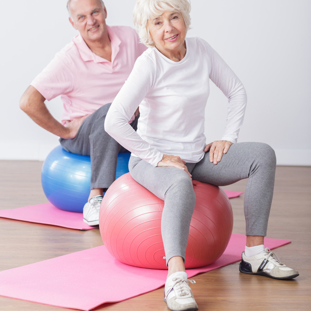 Sporty elderly couple having fun - Photo, Image