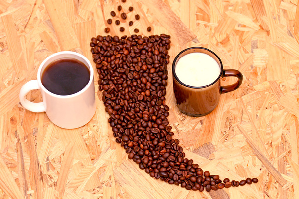 Ψητά φασόλια καφέ σε ξύλινο φόντο  - Φωτογραφία, εικόνα