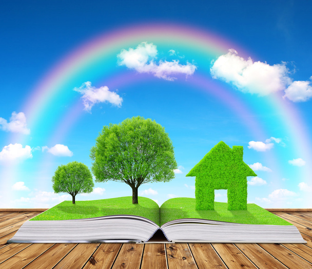 Livro ecológico com árvores e casa na mesa
 - Foto, Imagem