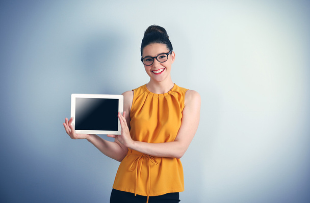 young businesswoman holding tablet  - Fotó, kép