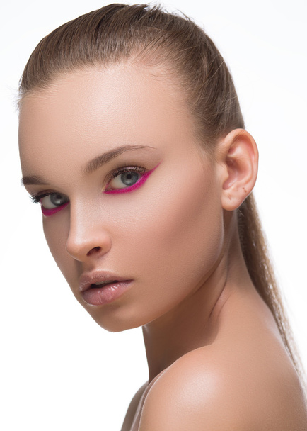 Glamour purple or magenta arrow makeup close with fashion red nails on face. Woman  perfect skin. Macro shot. Half-closed eye - Φωτογραφία, εικόνα