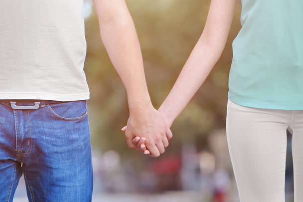 Couple holding hands - Foto, afbeelding