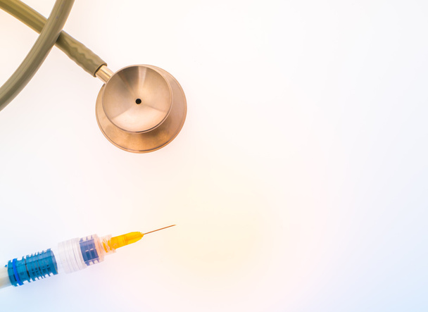 Plastic syringe with  stethoscope .  ( Filtered image processed  - Valokuva, kuva
