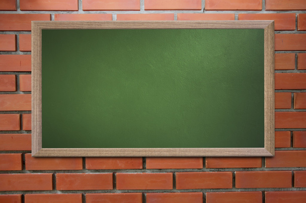 Blank old school blackboard on a grunge wall and can input text  - Foto, afbeelding