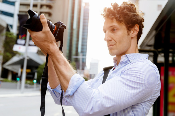 Male photographer taking picture - Foto, Imagem