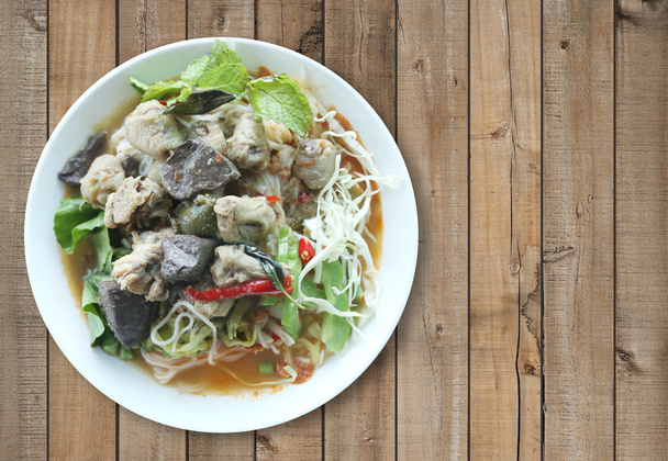 Curry chicken noodles (KHANOM CHIN) with vegetable. - Photo, Image