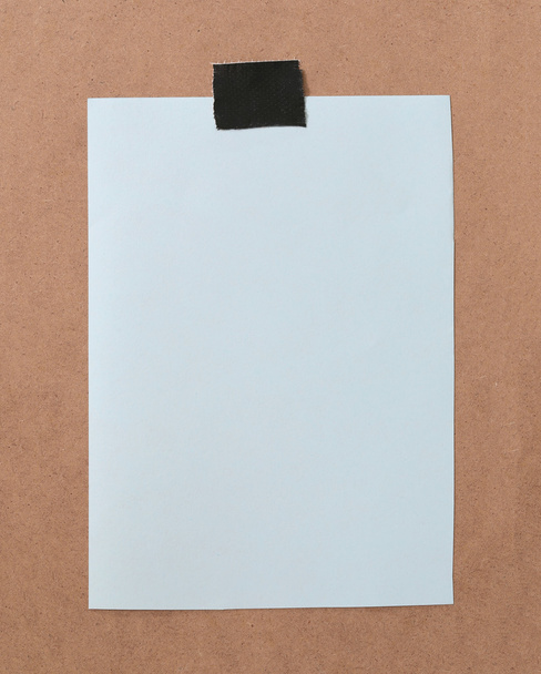 Paper note is empty space on brown wooden for design background. - Photo, Image