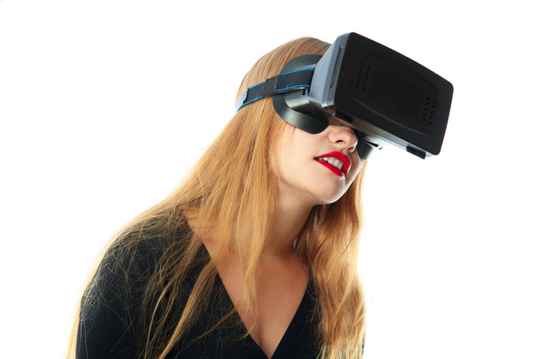 woman in virtual reality helmet - Фото, изображение