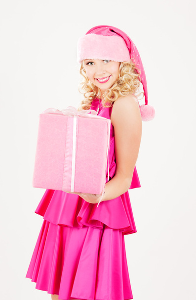 Cheerful santa helper girl with gift box - Фото, зображення