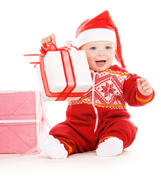 Santa helper baby with christmas gifts - Valokuva, kuva