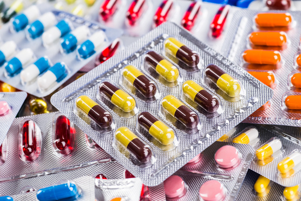 Colorful of oral medications on White Background. - Fotografie, Obrázek
