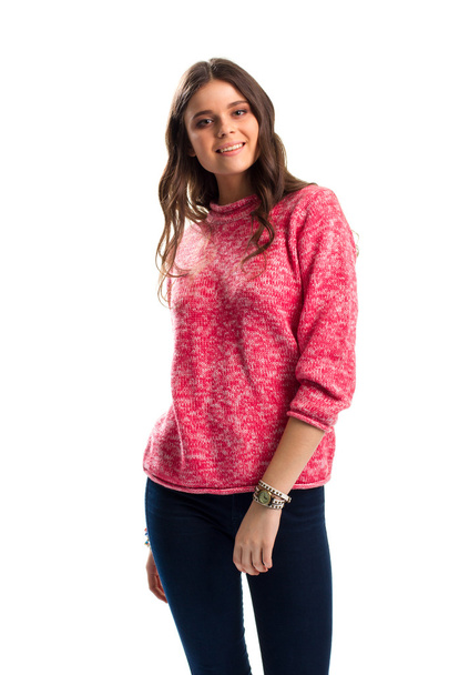 Girl in pink sweater smiling. - Фото, зображення