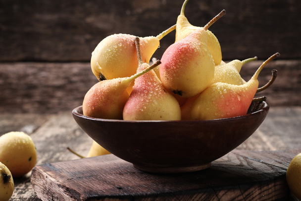 ripe pears on vitage wooden table - Photo, image