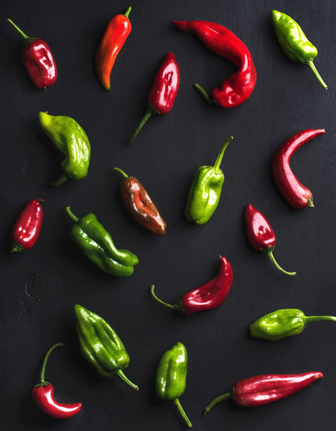 Pattern of small colorful hot chili peppers - Фото, изображение