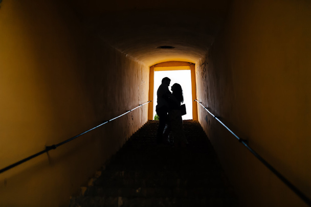 Silhouette of a couple hugging - Photo, image