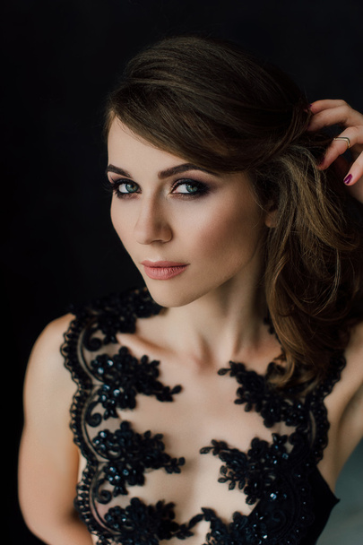 Close up. Individuality. Thoughtful Elegant Lady in Black Prom Evening Dress. Studio retouched photo. - Фото, изображение