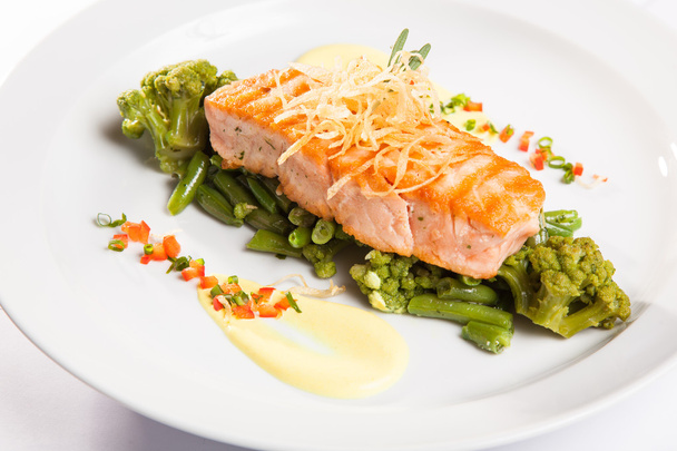 salmon steak on green beans on white plate - Photo, Image