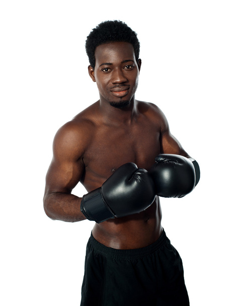 Muscular african boxer posing in style - 写真・画像