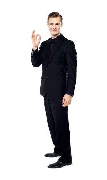Handsome man showing excellent gesture - Фото, изображение