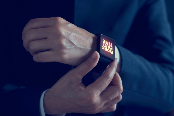 Businessman with work part time word on smartwatch screen - Zdjęcie, obraz