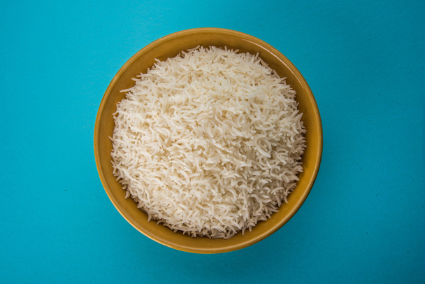 индийский рис басмати, пакистанский рис басмати, азиатский рис басмати, приготовленный рис басмати, приготовленный белый рис, приготовленный простой рис в миске
 - Фото, изображение
