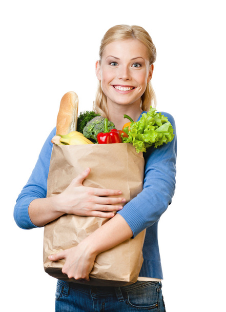 Beautiful woman with a bag full of healthy eating - Φωτογραφία, εικόνα