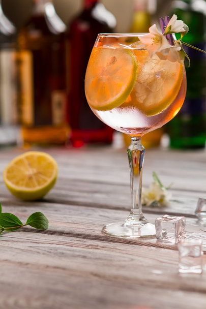 Cocktail with lemon slices. - Фото, зображення
