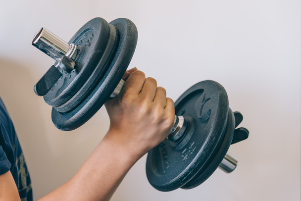 Man lifting weights - Foto, immagini
