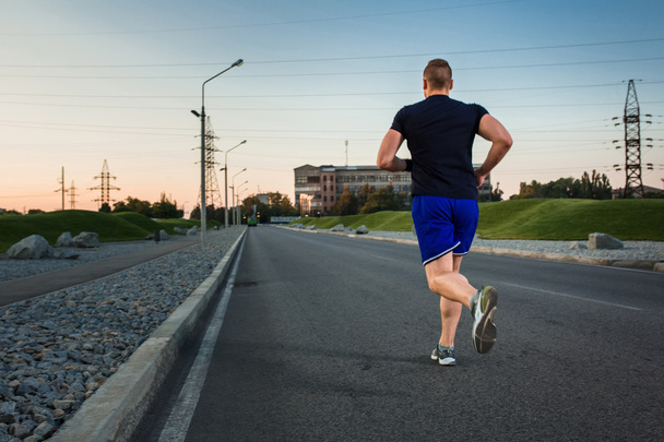 Full length portrait of athletic man running - Foto, Imagem