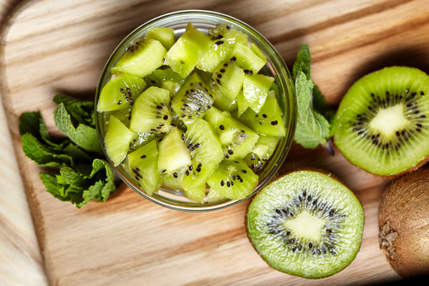 Healthy food. Tropical fruit. Whole and sliced kiwi. Kiwi fruit.  - Zdjęcie, obraz
