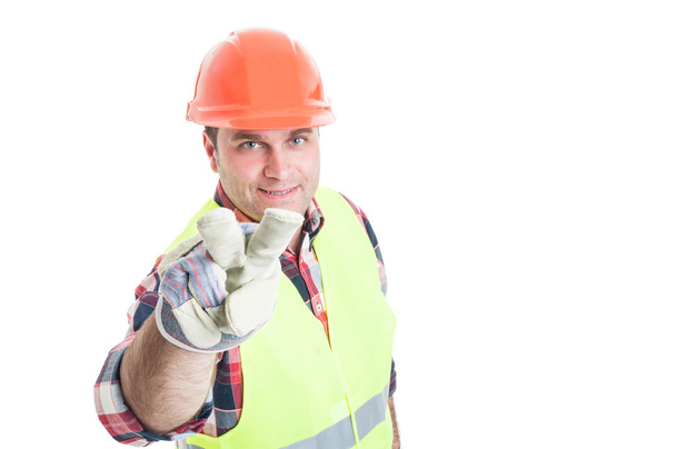 Male constructor making watching you hand gesture - Foto, imagen