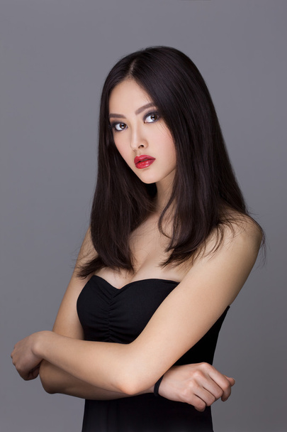 Studio fashion shot of Asian woman - Photo, Image