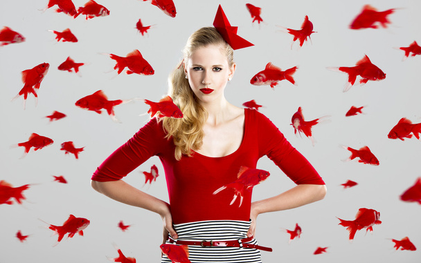 Fashion woman with red fishes - Foto, Imagen